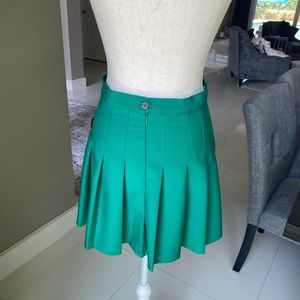 Green pleated skirt!